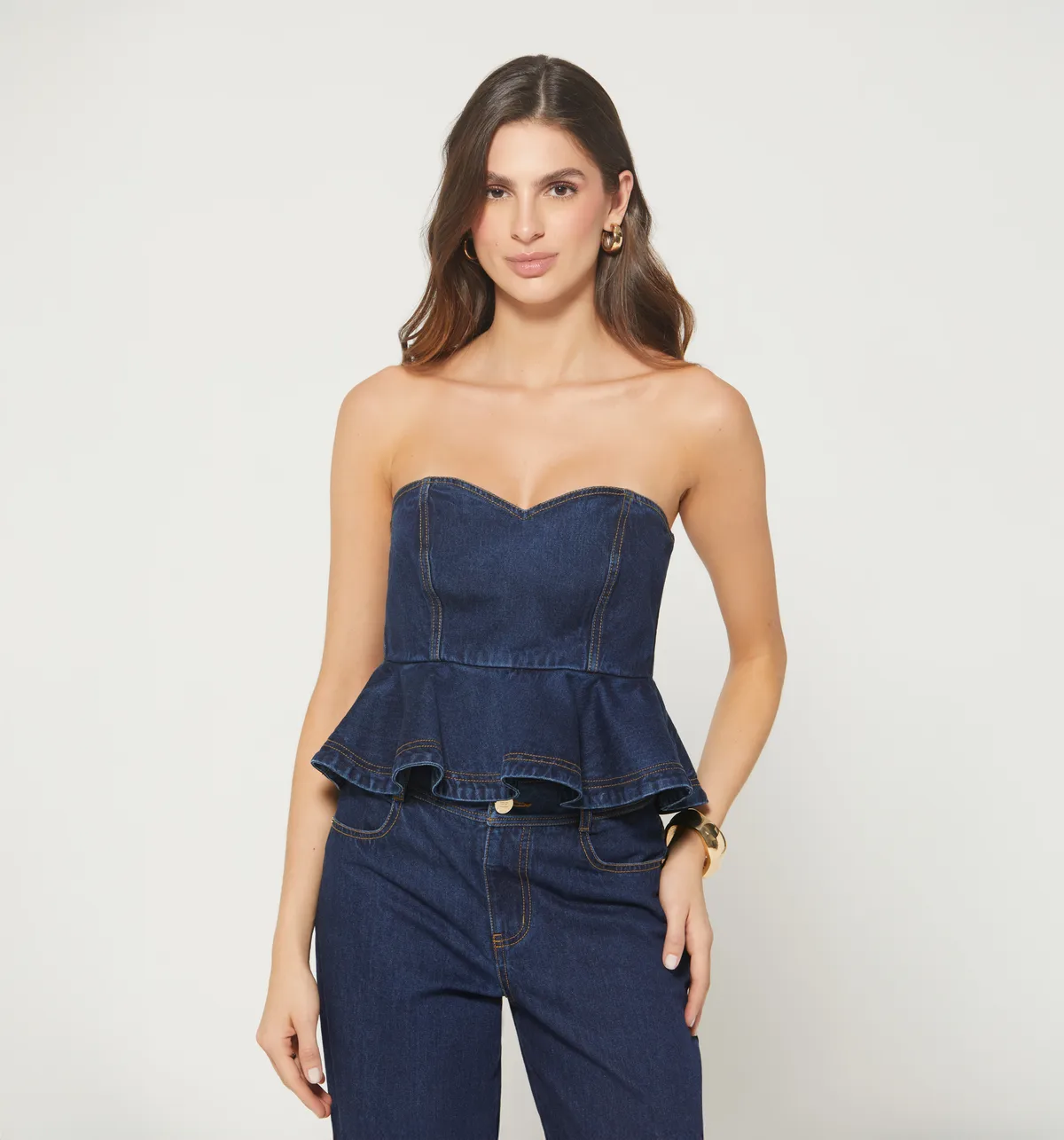 Blusa peplum en denim
